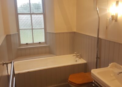 Bathroom design and build including new custom bead and butt timber panelling to walls