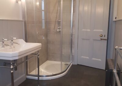 Bathroom design and build including new custom bead and butt timber panelling to walls