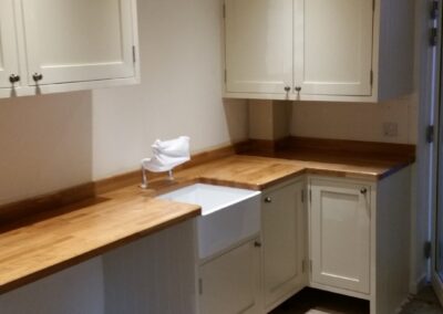 Bespoke hand made and finished utility room with solid oak worktops