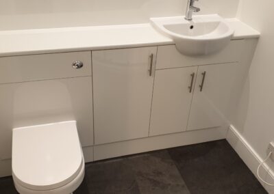 Contemporary fitted vanity area for shower room