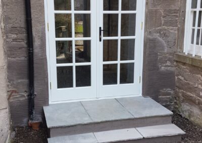 Existing window converted to French window with custom hardwood doors
