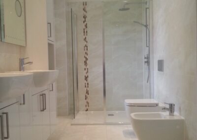 Shower room design and build with wall hung W.C. and bidet